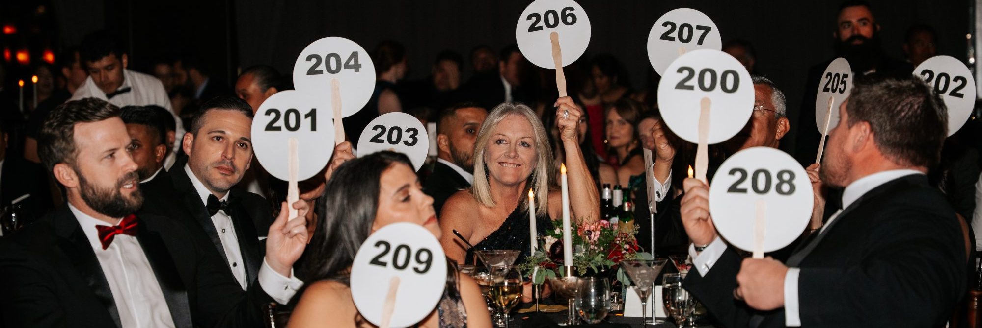 Bidders at benefit auction gala